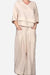Atelier Serenity Layered Two-Piece Set beige relaxed fit layered V-neck top and wide-leg trousers